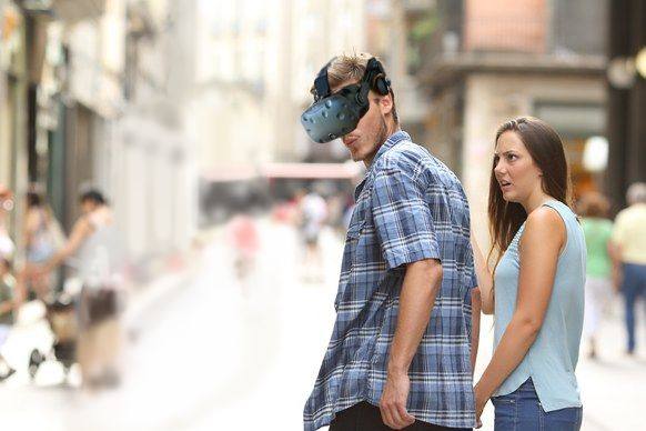 Distracted Boyfriend edit with the man wearing a virtual-reality headset