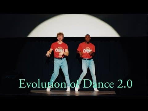 Two dancers perform on a stage under a spotlight with the words Evolution of Dance 2.0 across the bottom.