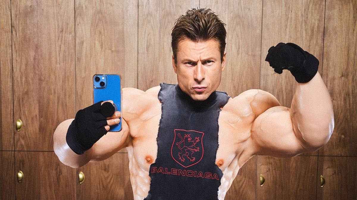 Glen Powell in the GQ editorial photograph used in the John Politics meme