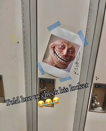 Realistic Troll Face image taped to a school locker
