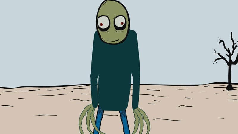 Salad Fingers stands in a barren landscape, his long leaf-like fingers hanging beside his legs and a bare tree in the distance.