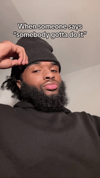 A reclining man reacting to the phrase “somebody gotta do it”