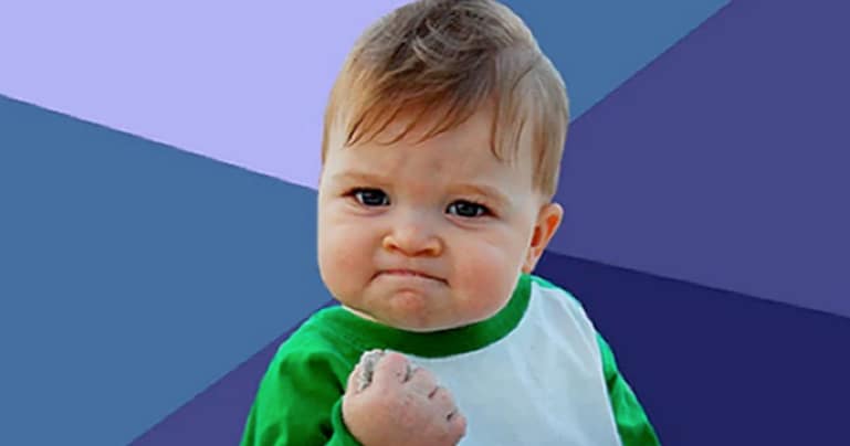 Success Kid cutout on a blue geometric background