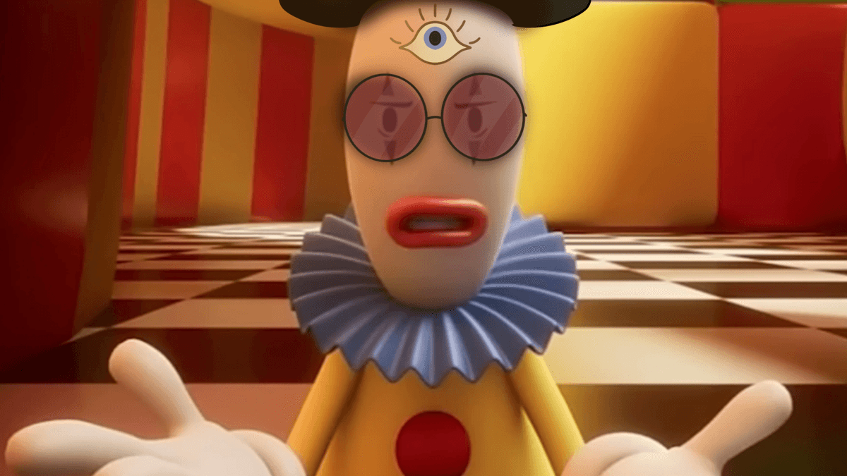Kaufmo wearing round glasses and a black hat while speaking to Jax