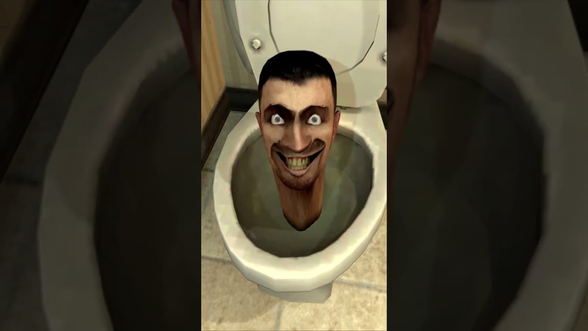 A grinning human head emerging from a toilet in the first Skibidi Toilet episode