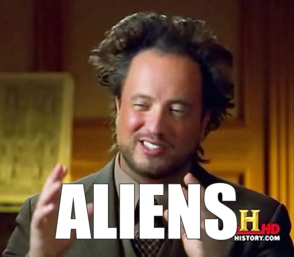 Giorgio Tsoukalos gesturing in the classic Ancient Aliens Guy image macro with the word Aliens