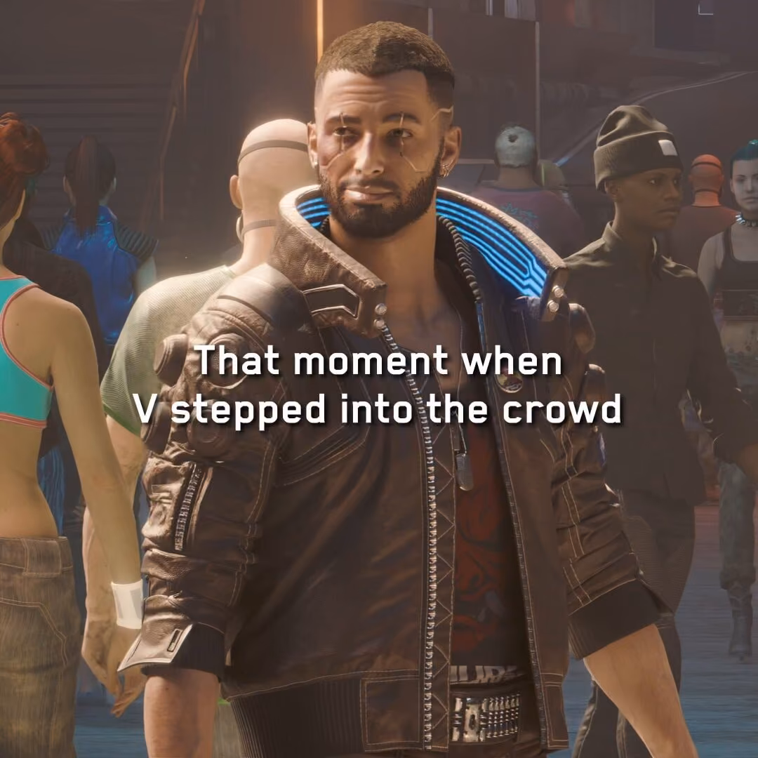 Cyberpunk 2077’s V standing in a crowd beneath the words “V stepped into the crowd”